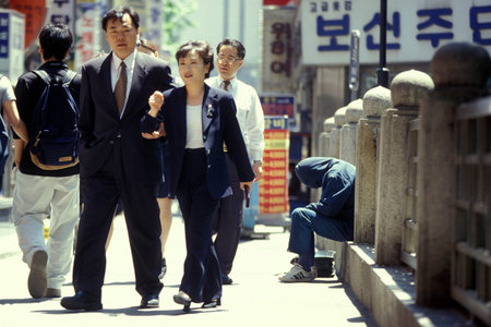 poor people at a road in the city of Seoul in South Korea in EastAasia.  Southkorea, Seoul, May,...