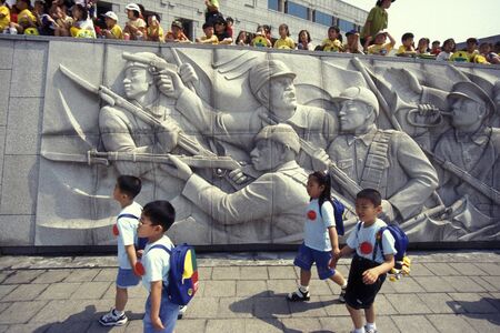 children at a monument of the Korean War Memorial in the city of Seoul in South Korea in EastAasia.  Southkorea, Seoul, May, 2006のeditorial素材