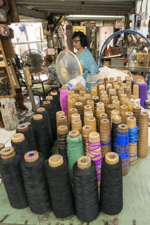 the Silk production and factory of Aood Bankura Thai silk at the Silk Village Baan Khrua at Siam Square in the city of Bangkok in Thailand in Southeastasia.  Thailand, Bangkok, November, 2018のeditorial素材