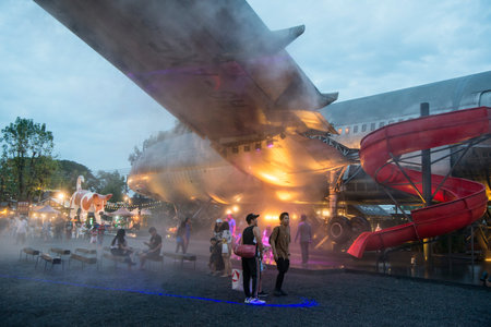 a Airplane at evening at the chang chui aircraft market north of the city of Bangkok in Thailand in...