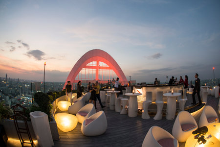 the Skyline of Bangkok by night and view from the Cru Bar of the Centara Grand Hotel in the city of...
