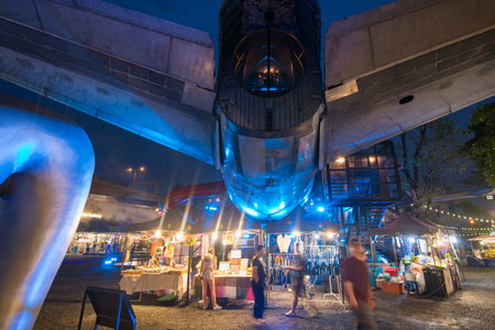 a Airplane at evening at the chang chui aircraft market north of the city of Bangkok in Thailand in...
