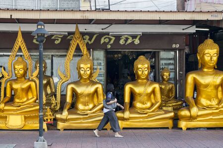 a shop with Buddha statues on the Siri Phong Road in Banglamphu in the city of Bangkok in Thailand in Southeastasia.  Thailand, Bangkok, November, 2018のeditorial素材