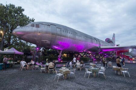 a Airplane at evening at the chang chui aircraft market north of the city of Bangkok in Thailand in Southeastasia.  Thailand, Bangkok, November, 2018のeditorial素材