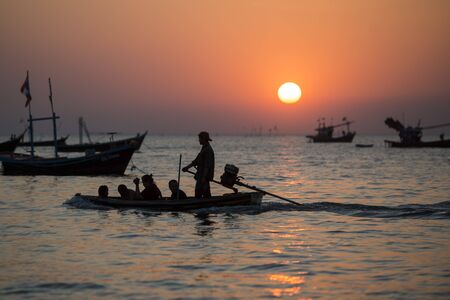 a sunset with fishing boats at the Bang Saen Beach at the Town of Bangsaen in the Provinz Chonburi in Thailand.  Thailand, Bangsaen, November, 2018のeditorial素材