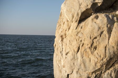 a rock and stone monument at the Coast of Laemtan at the Bang Saen Beach at the Town of Bangsaen in the Provinz Chonburi in Thailand.  Thailand, Bangsaen, November, 2018のeditorial素材