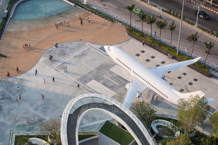 the architecture with a Airplane and Pool at the view from the Rooftop Bar at the Grand Centre Point...
