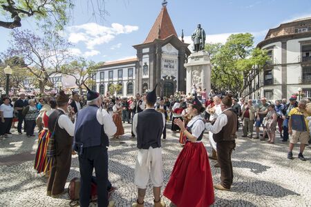 a traditonal madeira folklore music group s at the Festa da Flor or Spring Flower Festival in the city of Funchal on the Island of Madeira in the Atlantic Ocean of Portugal.  Madeira, Funchal, April, 2018のeditorial素材