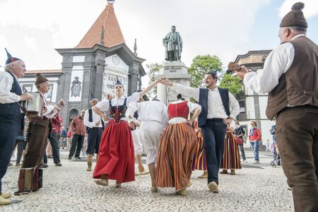 a traditonal madeira folklore music group s at the Festa da Flor or Spring Flower Festival in the city of Funchal on the Island of Madeira in the Atlantic Ocean of Portugal.  Madeira, Funchal, April, 2018のeditorial素材