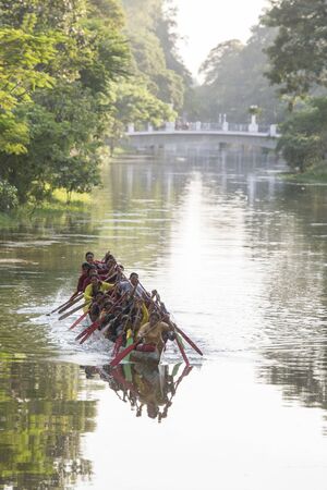 women at a training on a Longboat race at the Siem Reap River in the old Town in the city of Siem Reap in northwest of Cambodia.   Siem Reap, Cambodia, November 2018のeditorial素材