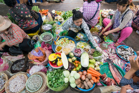 the fish and vegetable market at the old market of Phsar chas in the city of Siem Reap in northwest of Cambodia.   Siem Reap, Cambodia, November 2018のeditorial素材