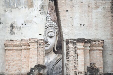 the Buddha at the Wat Si Chum at the Historical Park in Sukhothai in the Provinz Sukhothai in Thailand.   Thailand, Sukhothai, November, 2018のeditorial素材