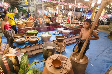 a Thai food market street at the Loy Krathong festival at the Historical Park in Sukhothai in the Provinz Sukhothai in Thailand.   Thailand, Sukhothai, November, 2018のeditorial素材