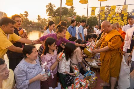 a buddhism Monk ceremony at the Loy Krathong Festival in the Historical Park in Sukhothai in the Provinz Sukhothai in Thailand.   Thailand, Sukhothai, November, 2018のeditorial素材