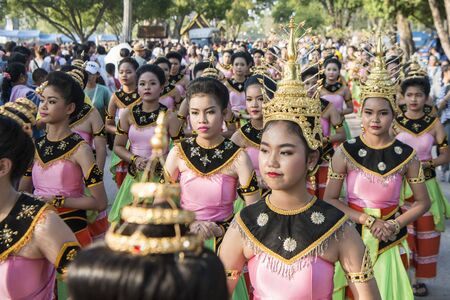 traditional dresst thai women at the Loy Krathong Festival in the Historical Park in Sukhothai in the Provinz Sukhothai in Thailand.   Thailand, Sukhothai, November, 2018のeditorial素材