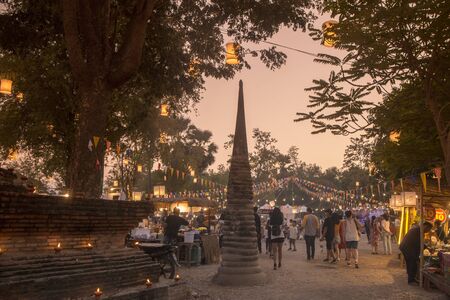 a market street at the Loy Krathong festival at the Historical Park in Sukhothai in the Provinz Sukhothai in Thailand.   Thailand, Sukhothai, November, 2018のeditorial素材