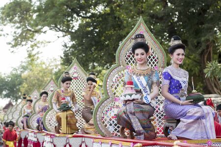 traditional dresst thai people at the Loy Krathong Festival in the Historical Park in Sukhothai in the Provinz Sukhothai in Thailand.   Thailand, Sukhothai, November, 2018のeditorial素材