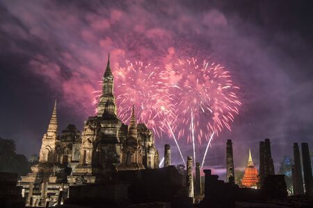 a firework on the Loy Krathong festival at the Wat Mahathat Temple at the Historical Park in Sukhothai in the Provinz Sukhothai in Thailand.   Thailand, Sukhothai, November, 2018のeditorial素材