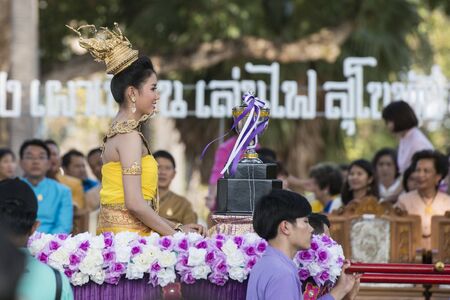 a miss with her winning price at the Loy Krathong Festival in the Historical Park in Sukhothai in the Provinz Sukhothai in Thailand.   Thailand, Sukhothai, November, 2018のeditorial素材