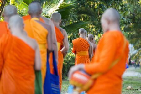 a buddhism Monk ceremony at the Loy Krathong Festival in the Historical Park in Sukhothai in the Provinz Sukhothai in Thailand.   Thailand, Sukhothai, November, 2018のeditorial素材