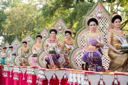 traditional dresst thai people at the Loy Krathong Festival in the Historical Park in Sukhothai in...