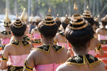 traditional dresst thai women at the Loy Krathong Festival in the Historical Park in Sukhothai in the Provinz Sukhothai in Thailand.   Thailand, Sukhothai, November, 2018のeditorial素材