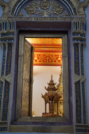 the Wat Phra Bat Ming Meuang Worawiharn in the old Town the city centre of Phrae in the north of Thailand.  Thailand, Phrae November, 2018.のeditorial素材