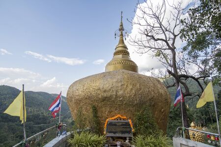 a golden rock at the Wat Phra That In Khaen Temple near the city of  Phrae in the north of Thailand.  Thailand, Phrae November, 2018.のeditorial素材