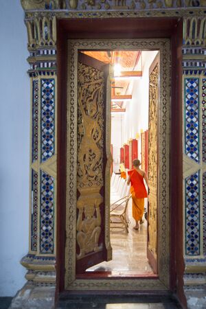 the Wat Phra Bat Ming Meuang Worawiharn in the old Town the city centre of Phrae in the north of Thailand.  Thailand, Phrae November, 2018.のeditorial素材