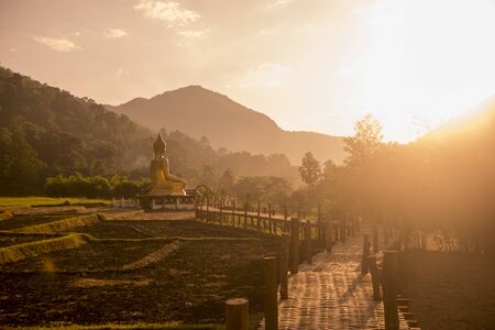the Big Buddha of the Wat Khuha in the country side of Ban Nakhuha near the city of  Phrae in the north of Thailand.  Thailand, Phrae November, 2018.のeditorial素材