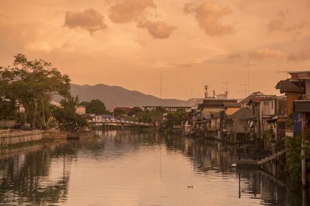 The waterfront at of Chanthaboon on the Mae Nam Chanthaburi River in old town of the city of  Chanthaburi in the north of Thailand.  Thailand, Chanthaburi, November, 2018.のeditorial素材