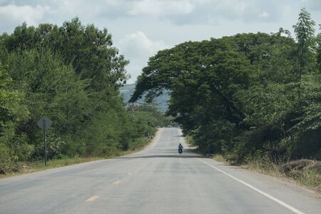 a highway or overland road near the city of Battambang in Cambodia.  Cambodia, Battambang, November, 2018のeditorial素材