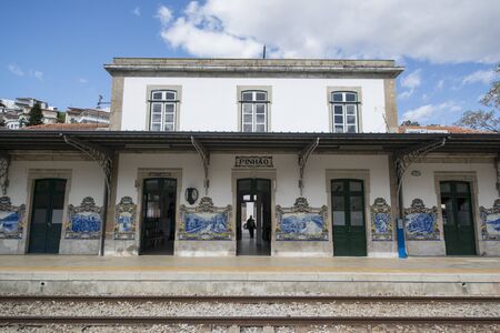 hand painted tile azulejo at the Railway station in the town of Pinhao on the Douro river, east of Porto in Portugal in Europe.  Portugal, Regua, April, 2019のeditorial素材