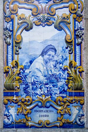 hand painted tile azulejo at the Railway station in the town of Pinhao on the Douro river, east of Porto in Portugal in Europe.  Portugal, Regua, April, 2019のeditorial素材