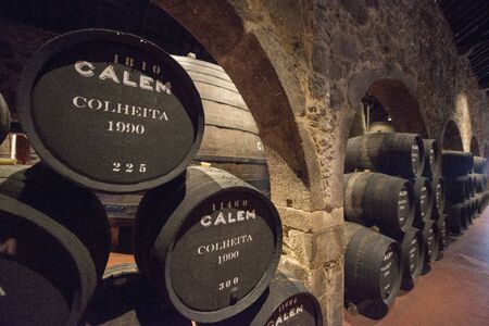 one of the Port wine Cellar of Calem at the waterfront  on the Douro River in Ribeira in the city centre of Porto in Porugal in Europe.   Portugal, Porto, April, 2019のeditorial素材