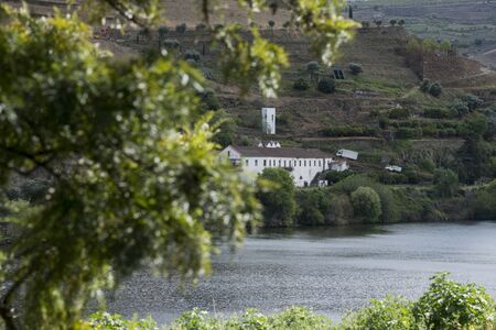 a winery in the Landscape of the Douro River betwen the towns of Reso da Regua and Pinhao east of Porto in Portugal in Europe.  Portugal, Regua, April, 2019のeditorial素材