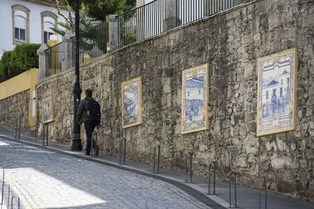 hand painted tile azulejo in the city centre of the town of Peso da Regua on the Douro river, east of Porto in Portugal in Europe.  Portugal, Regua, April, 2019のeditorial素材
