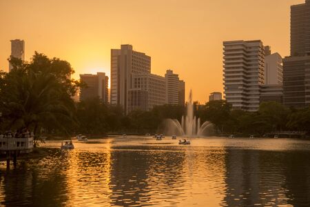 The Lumphini Park with the Skyline in the city of Bangkok in Thailand in Southest Asia.  Thailand, Bangkok, November, 2019のeditorial素材