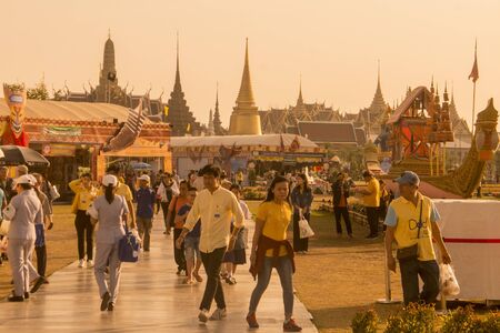 people in front of the wat phra kaew at the Sanam Luang Park in the city of Bangkok in Thailand in Southest Asia.  Thailand, Bangkok, November, 2019のeditorial素材