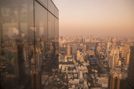 the skyline from the Roof Top of the Maha Nakhon Building in Sathon in the city of Bangkok in Thailand in Southest Asia.  Thailand, Bangkok, November, 2019のeditorial素材