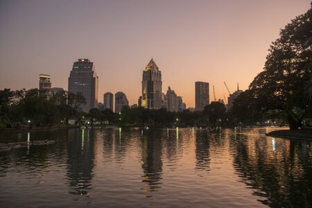 The Lumphini Park with the Skyline in the city of Bangkok in Thailand in Southest Asia.  Thailand, Bangkok, November, 2019のeditorial素材