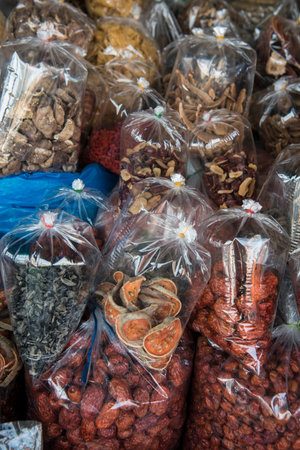 dry fruits at the food market in the town of Mae Sai on the Border to Myanmar in the Chiang Rai Province in North Thailand.   Thailand, Mae Sai, November, 2019のeditorial素材