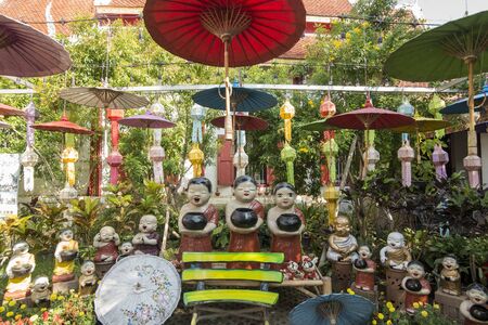 The Wat Pha Khao with thai umbrellas in the city of Chiang Mai at north Thailand.   Thailand, Chiang Mai, November, 2019のeditorial素材