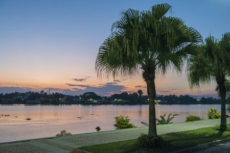 the landscape at the Ping River in the evening in the town of Kamphaeng Phet in the Kamphaeng Phet Province in North Thailand.   Thailand, Kamphaeng Phet, November, 2019のeditorial素材