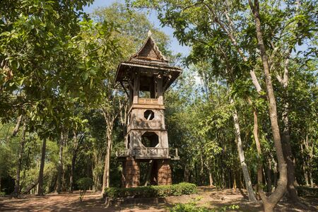 a traditional wood Toer at the Wat Chang Rob Temple in the town of Kamphaeng Phet in the Kamphaeng Phet Province in North Thailand.   Thailand, Kamphaeng Phet, November, 2019のeditorial素材