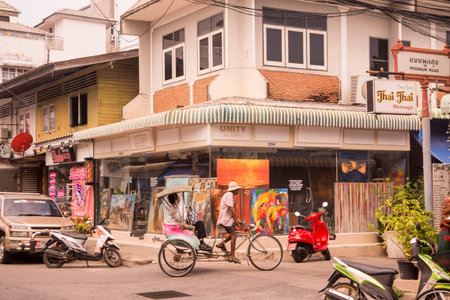 a street with shops in the City centre of Hua Hin in Thailand.   Thailand, Hua Hin, November, 2019