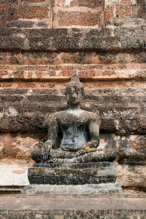 a Buddha statue at the Wat Mahathat Temple at the Historical Park in Sukhothai in the Provinz Sukhothai in Thailand.   Thailand, Sukhothai, November, 2019のeditorial素材