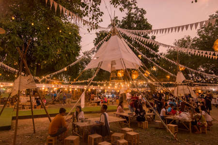 people at the Loy Krathong Festival in the Historical Park in Sukhothai in the Provinz Sukhothai in Thailand.   Thailand, Sukhothai, November, 2019のeditorial素材