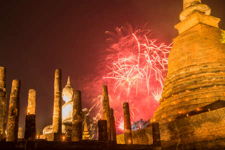 a firework on the Loy Krathong festival at the Wat Sa Si Temple at the Historical Park in Sukhothai in the Provinz Sukhothai in Thailand.   Thailand, Sukhothai, November, 2019のeditorial素材