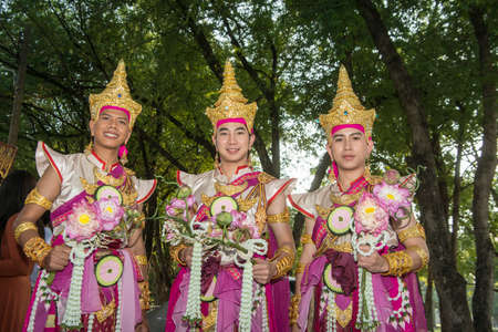 traditional dresst thai people at the Loy Krathong Festival in the Historical Park in Sukhothai in the Provinz Sukhothai in Thailand.   Thailand, Sukhothai, November, 2019のeditorial素材